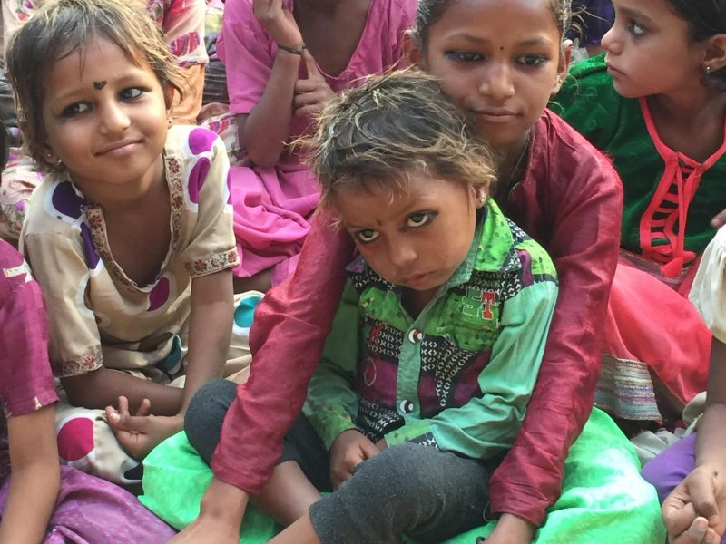 Students at a village school gather for a performance.