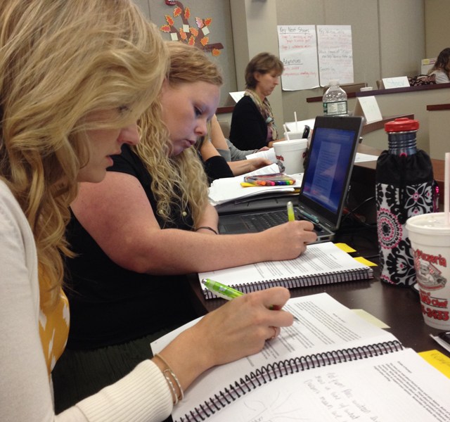 Lori Smith (left) and Heather Hobbs (right), two teacher leaders in the Kingsport City Schools district, participate in a Common Core training session in Kingsport, Tenn.